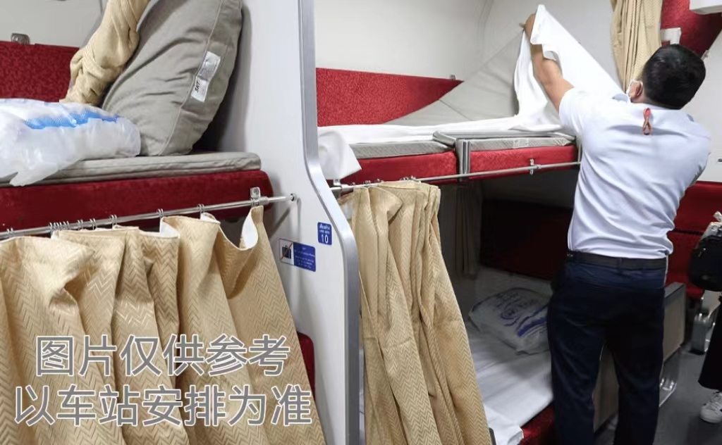 Attendant preparing a sleeper berth